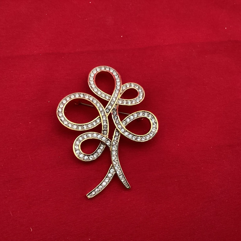 Gold tone with rhinestones Butler brooch (imperfect?)